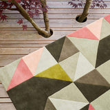 Tielles Rose Rug is a modern geometric rug which features a beautiful mix of pink, green and greys.