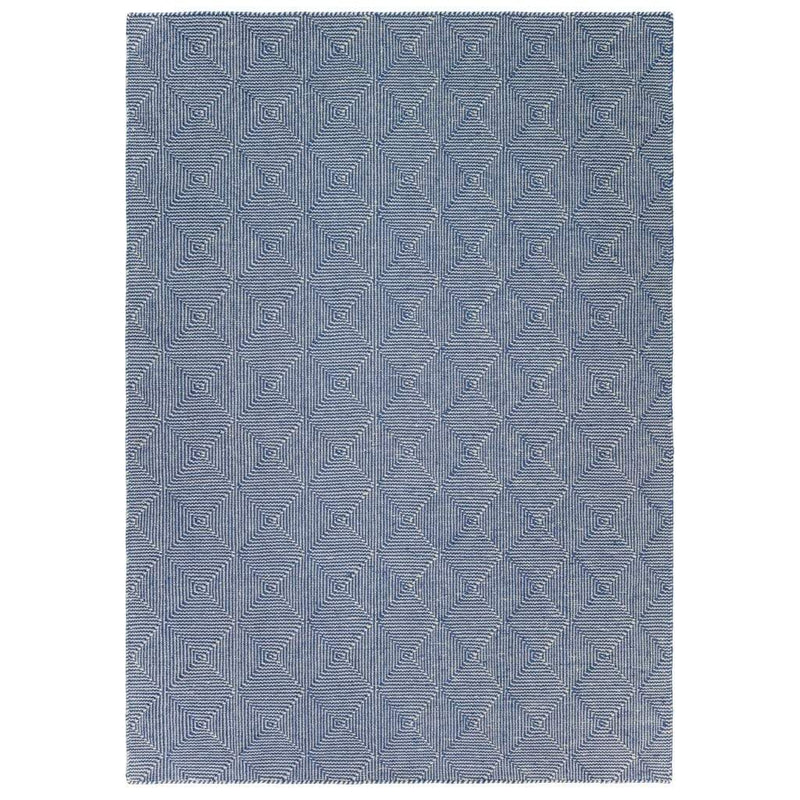 Zala Denim Rug - a blue recycled rug, handloom woven from 100% recycled plastic bottles. Our sustainable rugs are helping to combat plastic waste by using hundreds of recycled plastic bottles for each rug.