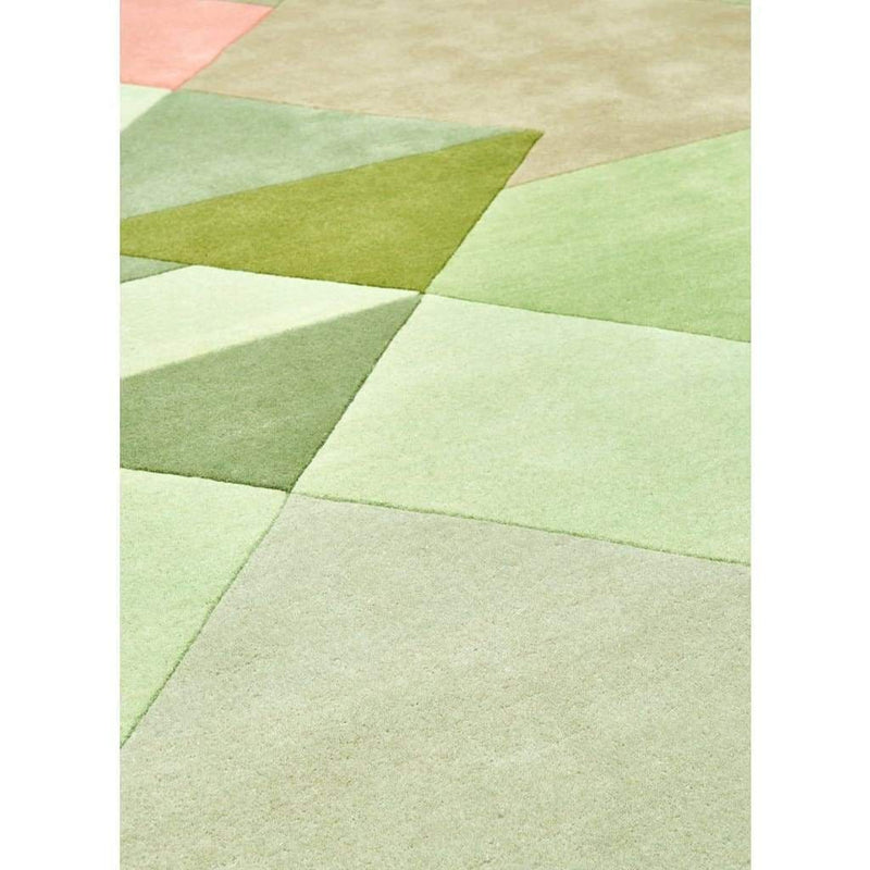 Bordeaux Vert Rug is a unique and stylish geometric patterned rug that pairs greens and pinks. Bring the outdoors in with our nature inspired wool rugs.