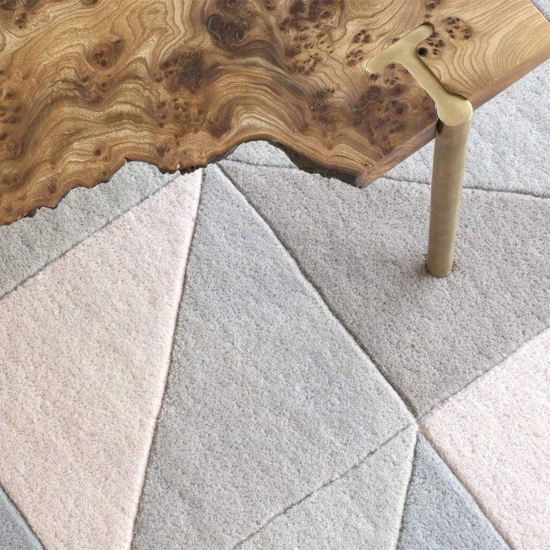 Tielles Neutral Rug is a modern geometric rug which features a gentle and relaxing mix of soft greys, taupes and warm natural shades. Rug detail showing the cut wool pile. 
