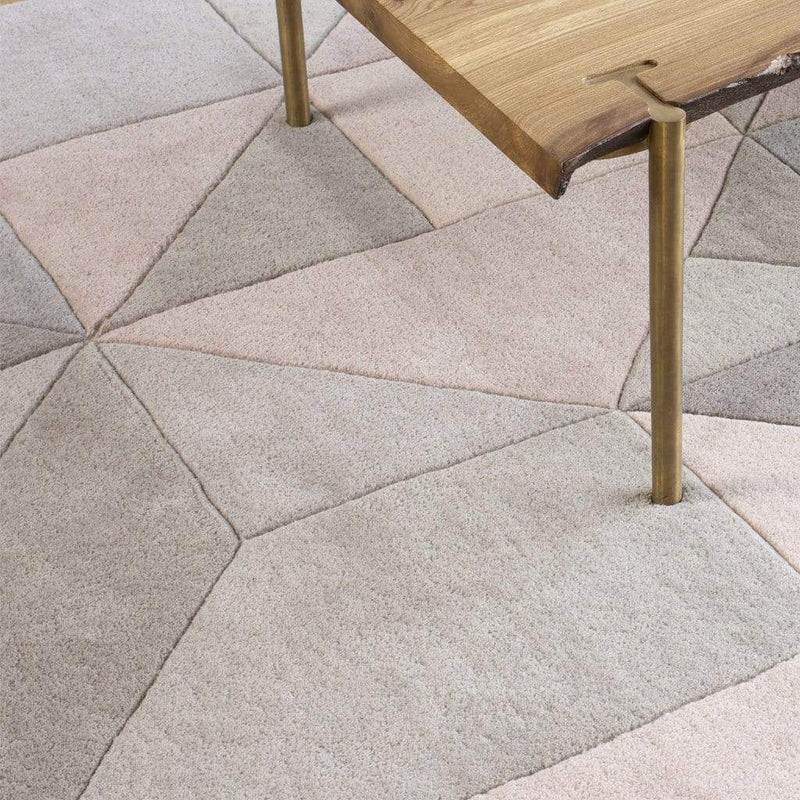 Tielles Neutral Rug is a modern geometric rug which features a gentle and relaxing mix of soft greys, taupes and warm natural shades. Product close-up.