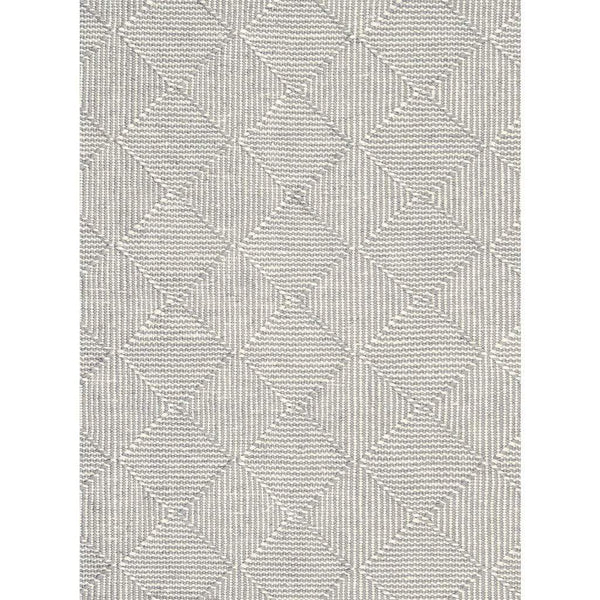 Zala Slate Rug is a recycled rug handwoven from 100% repurposed plastic bottles.  This recycled flat weave rug features a diamond weave pattern in pale grey and neutral yarns. Close up of weave shown.