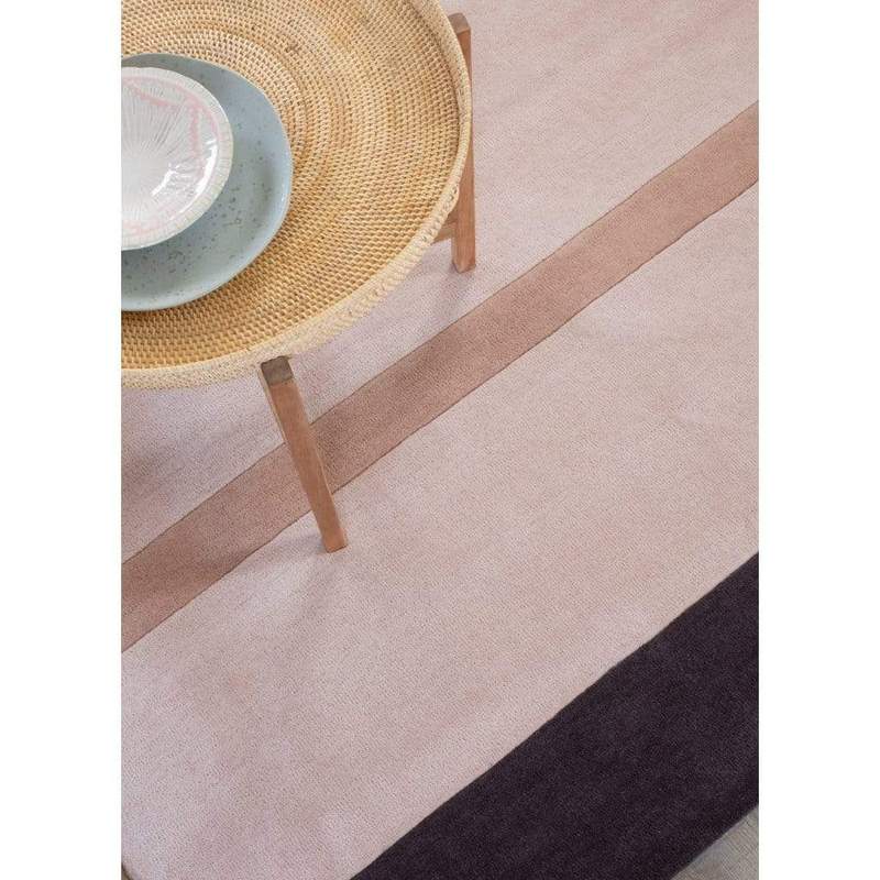 The Stripe Rug is designed with an earthy colour palette and a Fibonacci inspired stripe, and has a warming and relaxed character. 